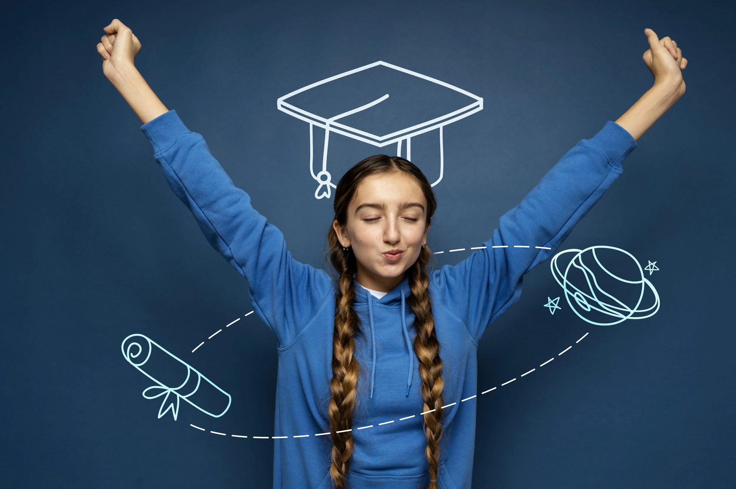 Young girl with long braids in a blue hoodie, eyes closed, arms raised in a victorious pose, and white doodles of a diploma, graduation cap, and planet orbiting each other on a dark blue background.