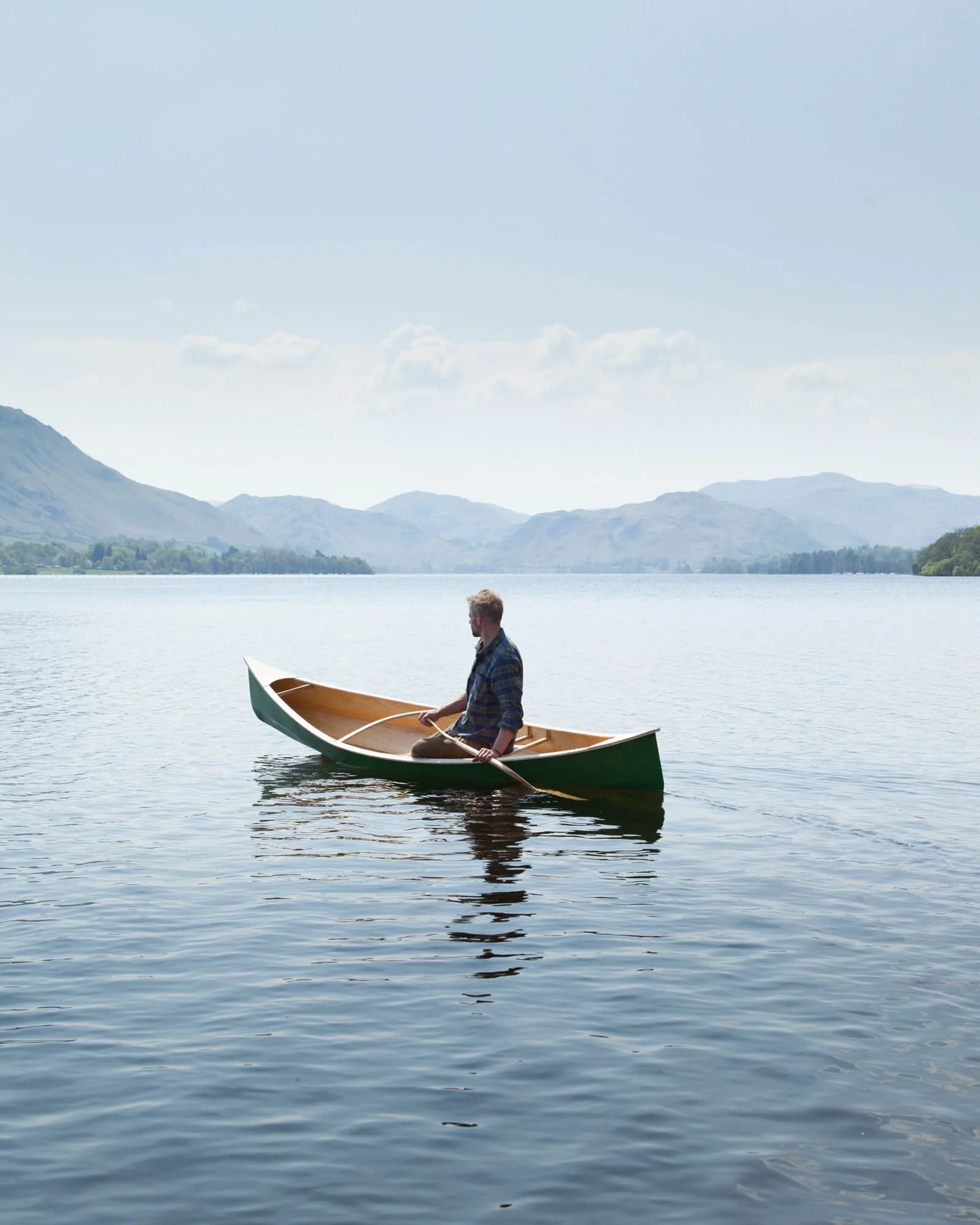 Canoeist on Lake Ullswater, Cumbria, The Lake District, UK