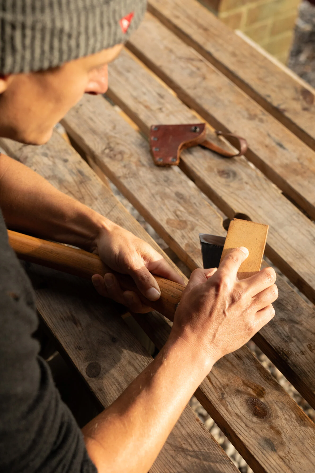 Naturalist, Andrew Groves, Sharpening Axe, West Sussex