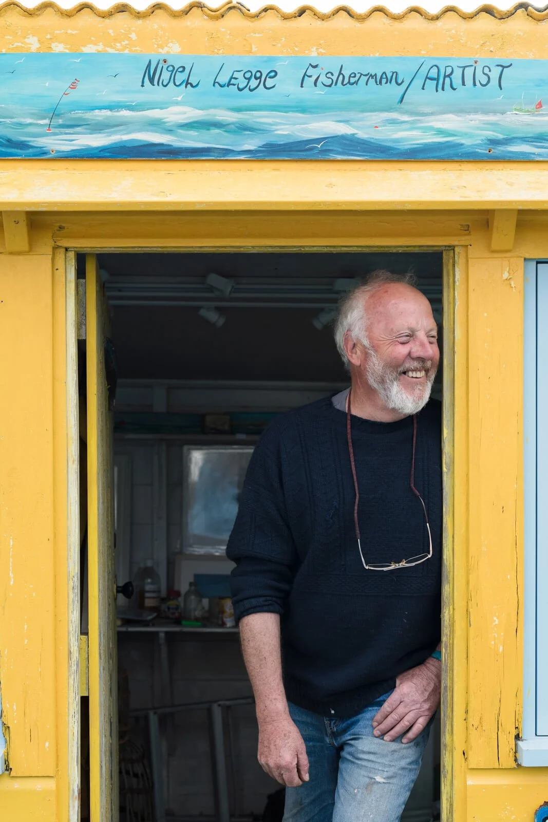 Environmental Portrait of Nigel Legge Stood in Studio Doorway Cornwall, UK