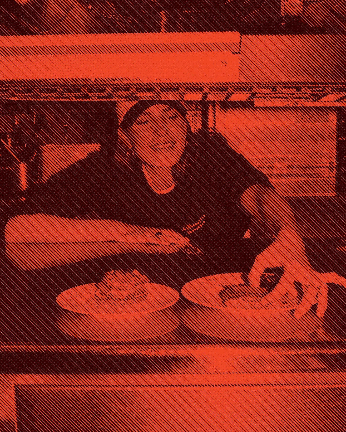 Person preparing food in a kitchen with plates of food on the counter.