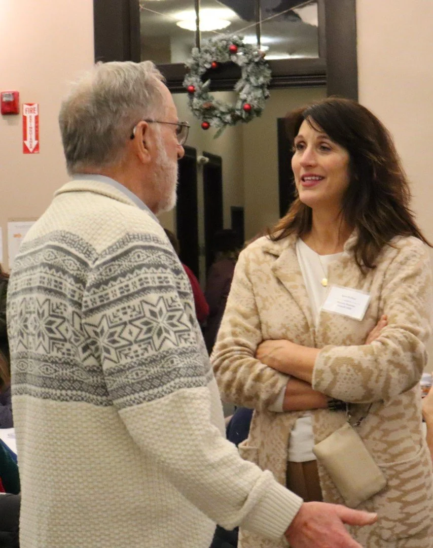 Sara Gullion speaking with a constituent.