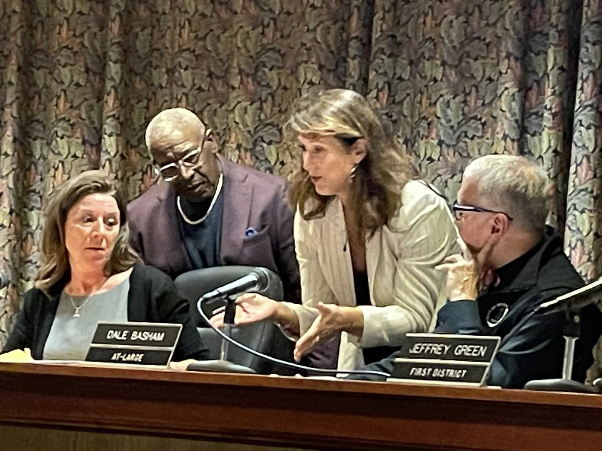 Muncie city councilors discuss at a meeting.