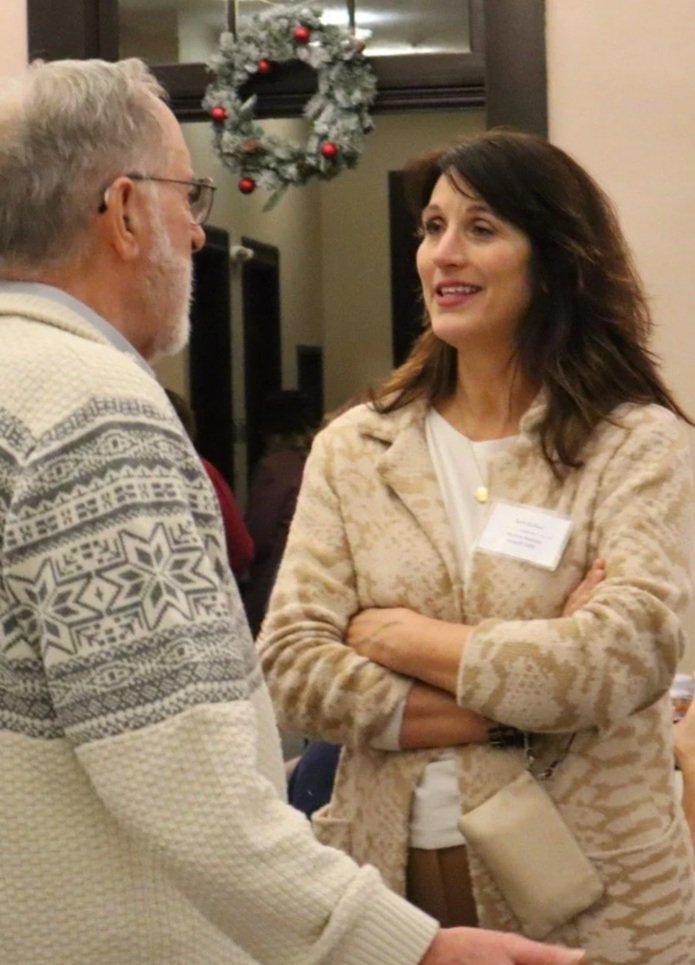 Sara Gullion speaks with constituent.