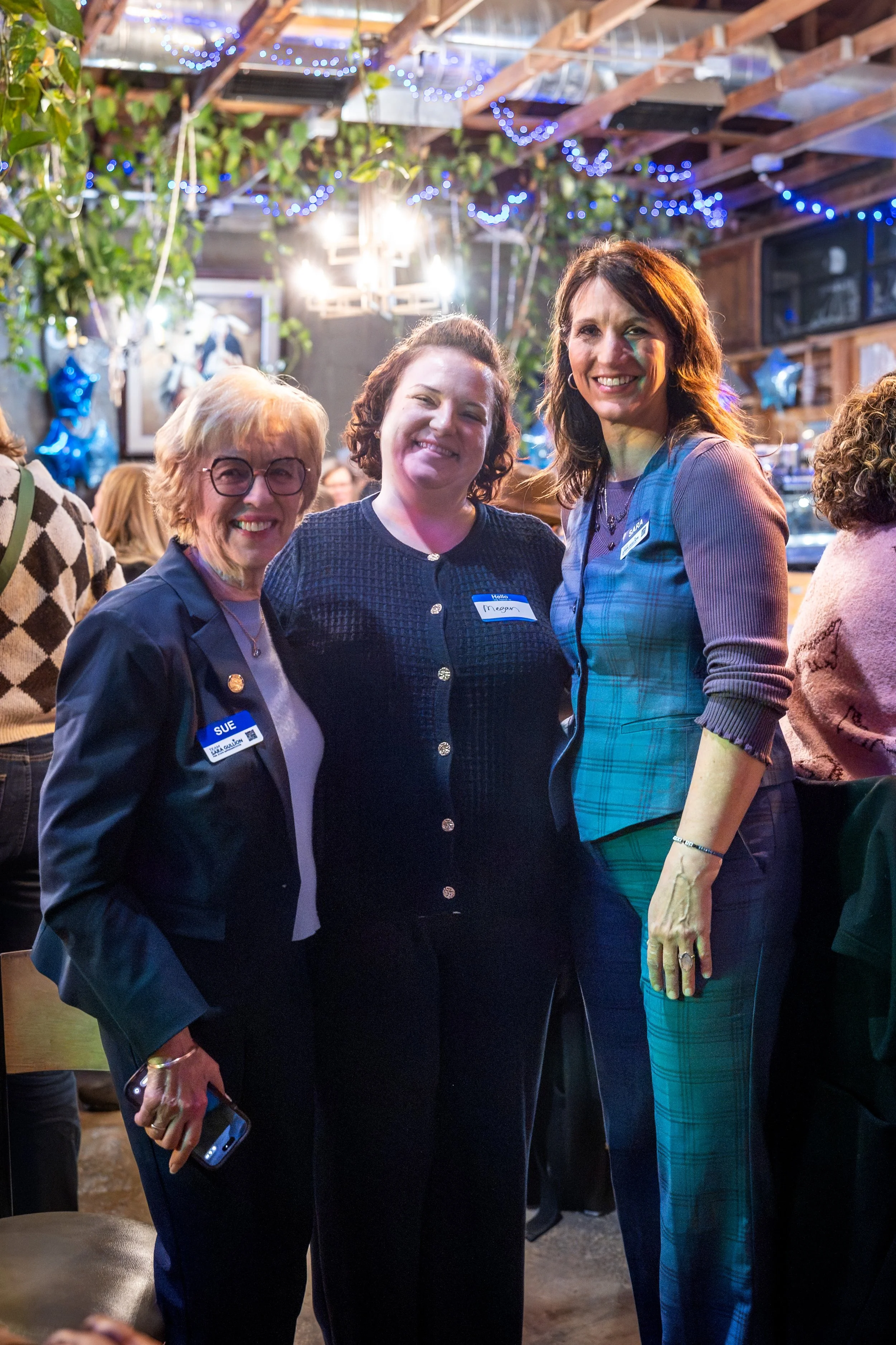 Sue Errington, Megan from IN democrats, and Sara Gullion pose at Sara's campaign kickoff.