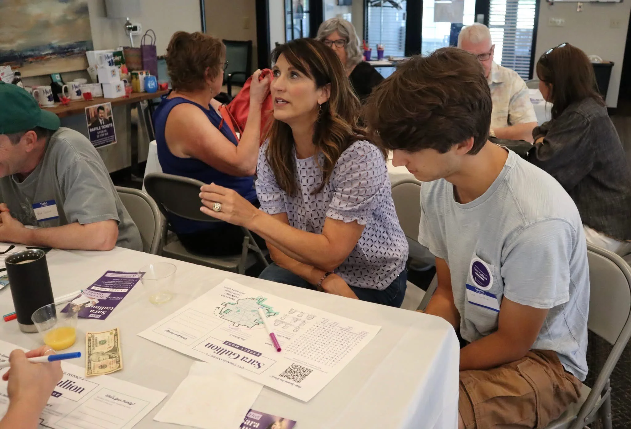 Sara Gullion with supporters and family at an event.