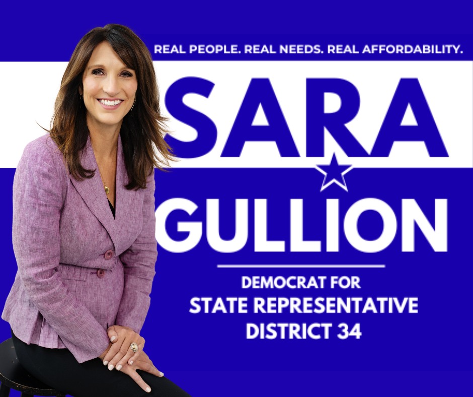 A campaign sign for Sara Gullion, a Democrat running for State Representative District 34. The sign features a woman with shoulder-length brown hair in a pink blazer, smiling, with text promoting her campaign and values.