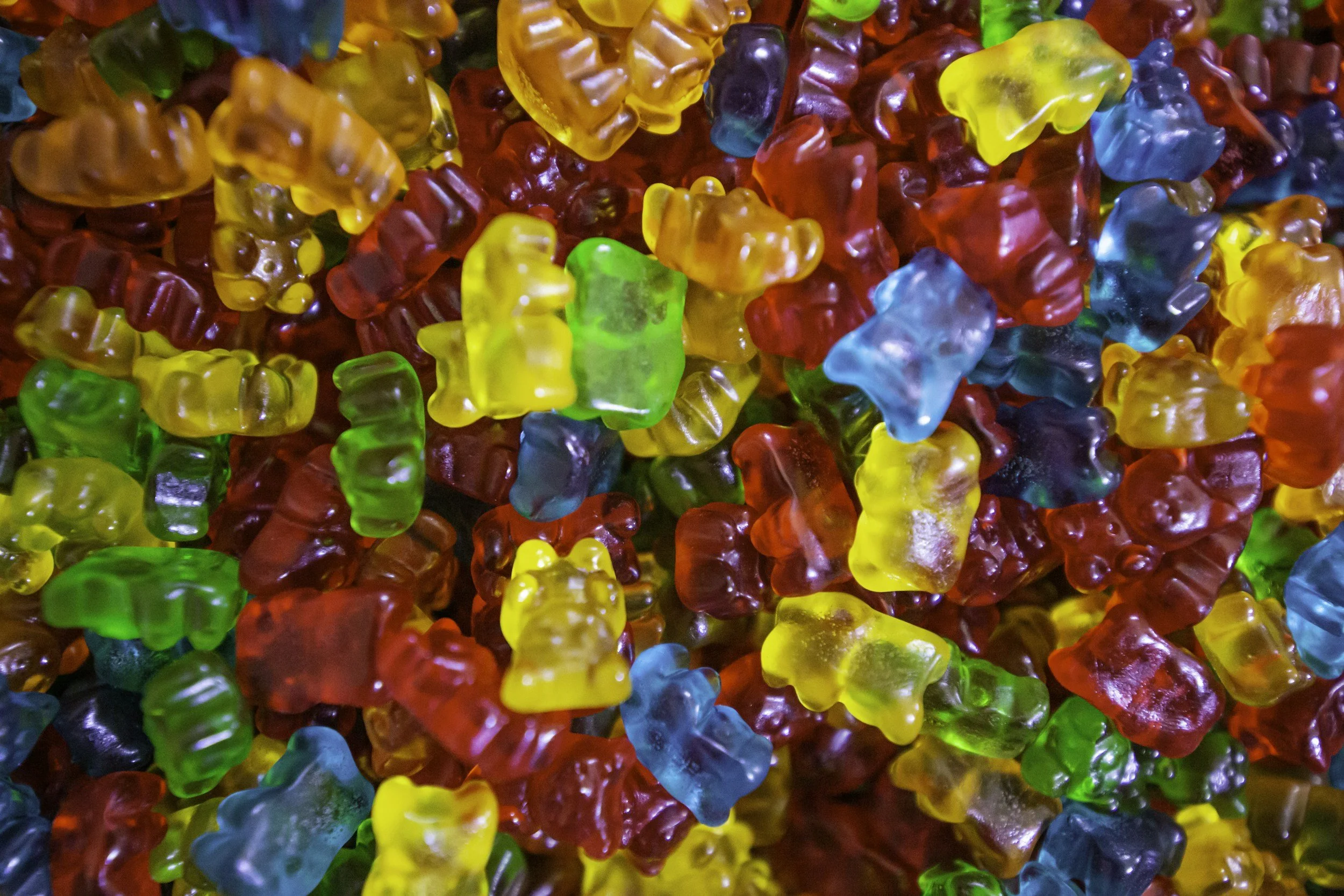Pile of rainbow colored gummy bears
