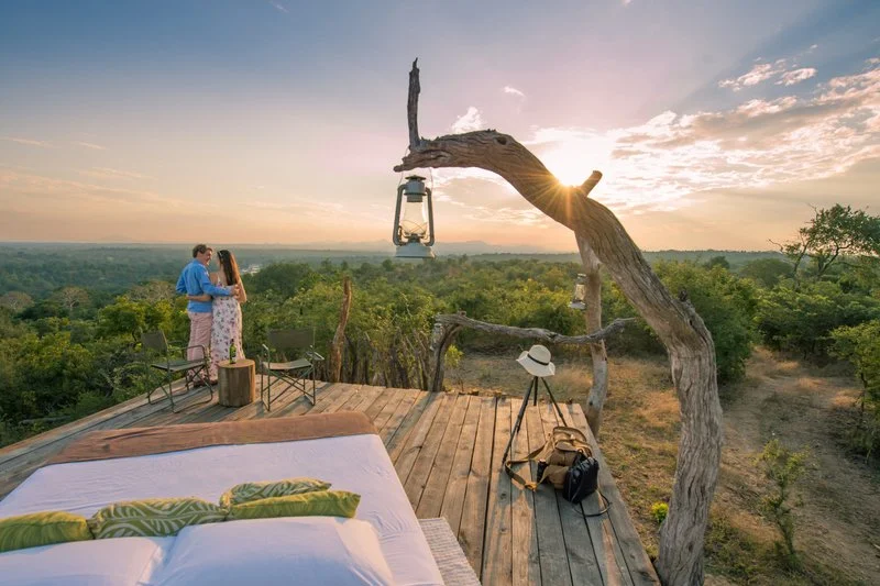 Open-air starbed with sunset views in Majete Wildlife Reserve, Malawi