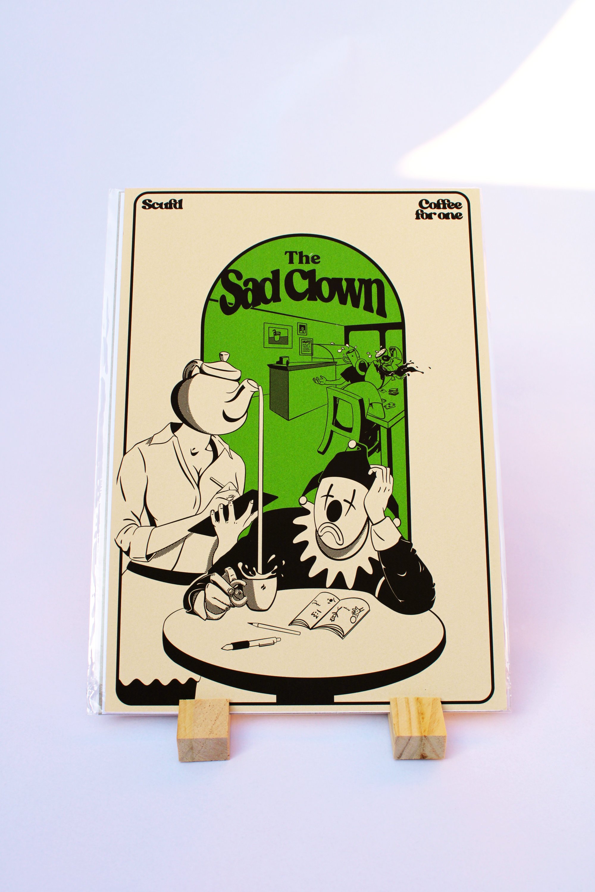 Sad Clown photo on stand.jpg