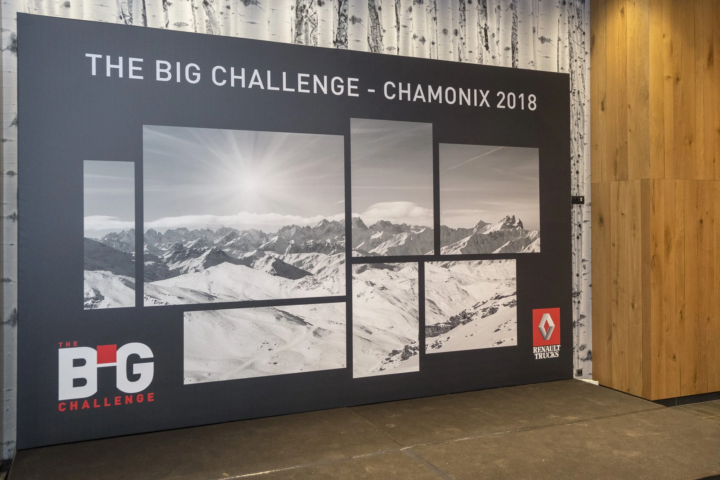 Affiche d'un défi de ski en montagne à Chamonix en 2018, avec des images de montagnes enneigées et le logo Renault Trucks.