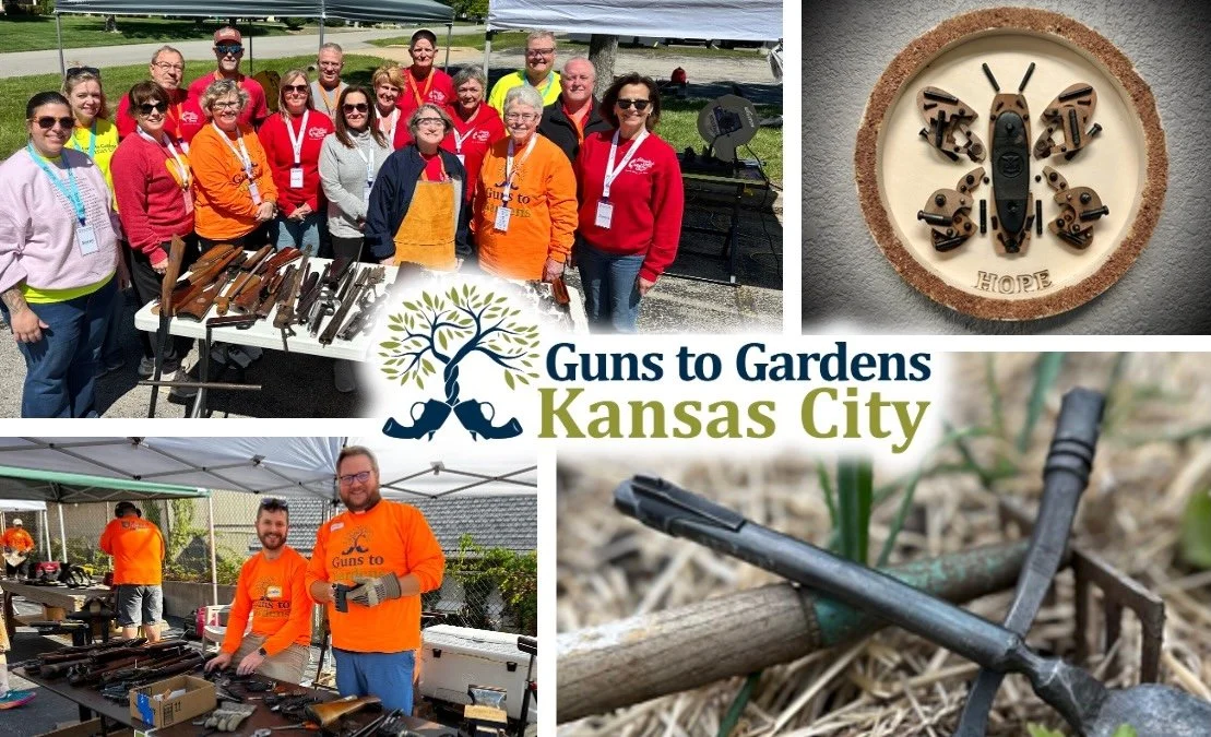 Group of people at a guns to gardens event in Kansas City with tables of firearms, outdoor tents, and a sign featuring a tree and crossed guns, promoting community gardening.