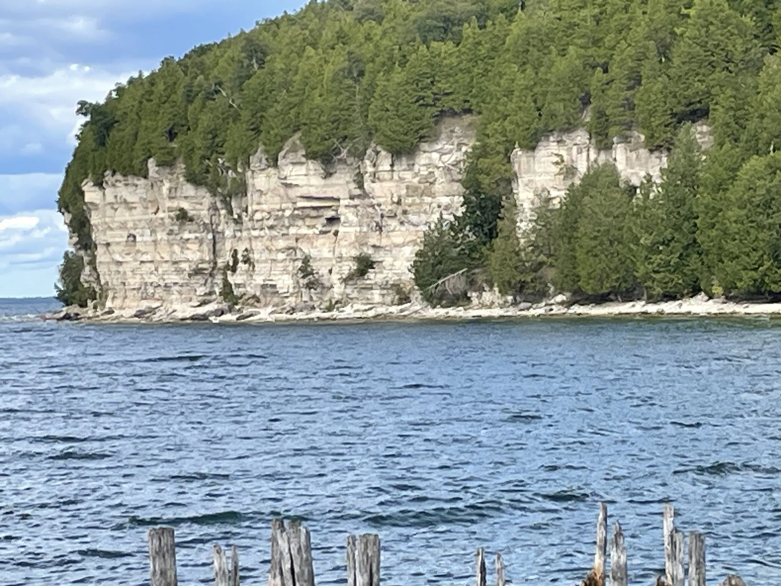 View of the cliff at Michigan's Fayette Historic State Park creating a bay for ships to dock.