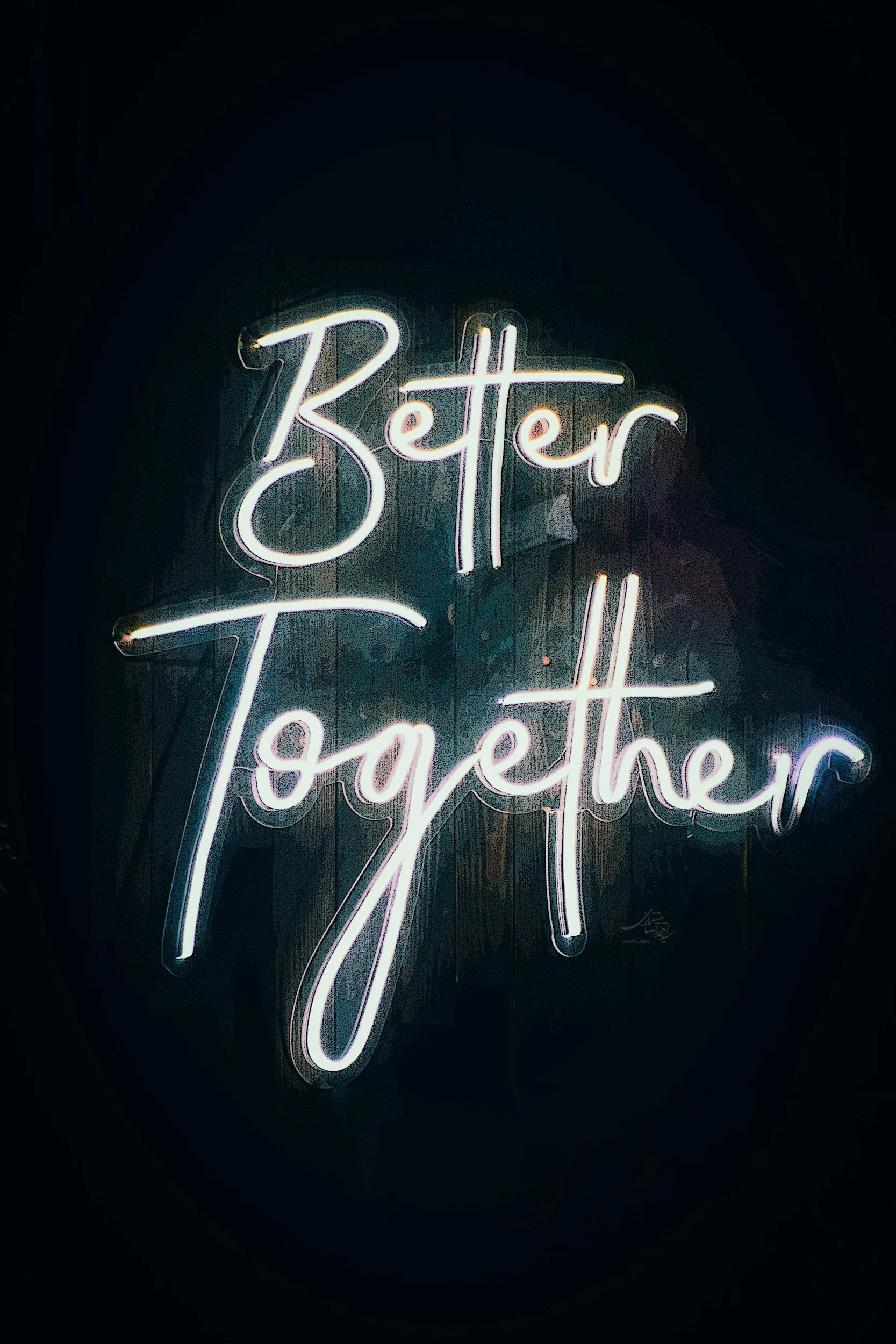 Neon sign reading 'Better Together' on a dark background.