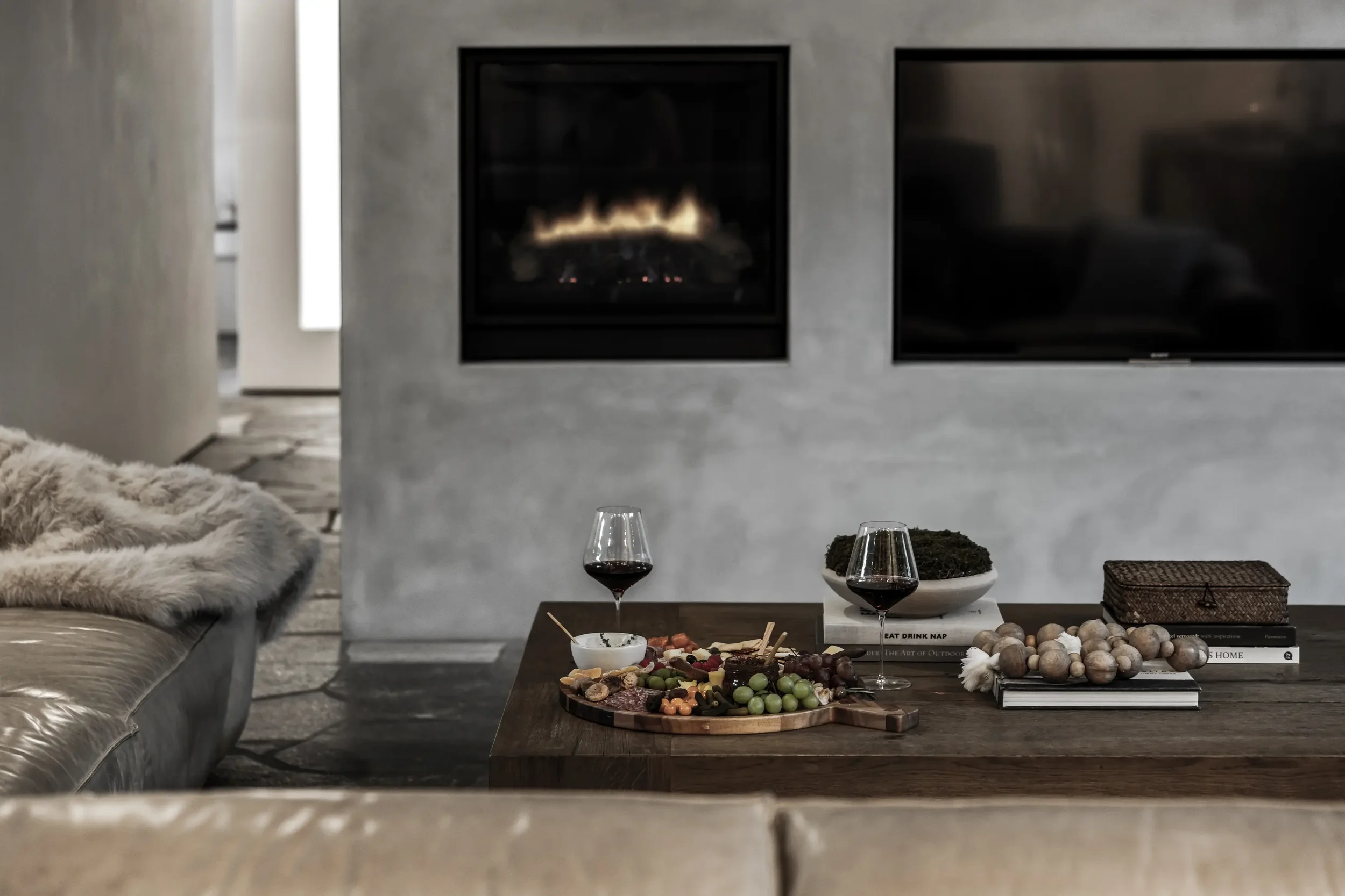 luxury-vacation-rental-scottsdale-modern-fireplace-living-room.webp