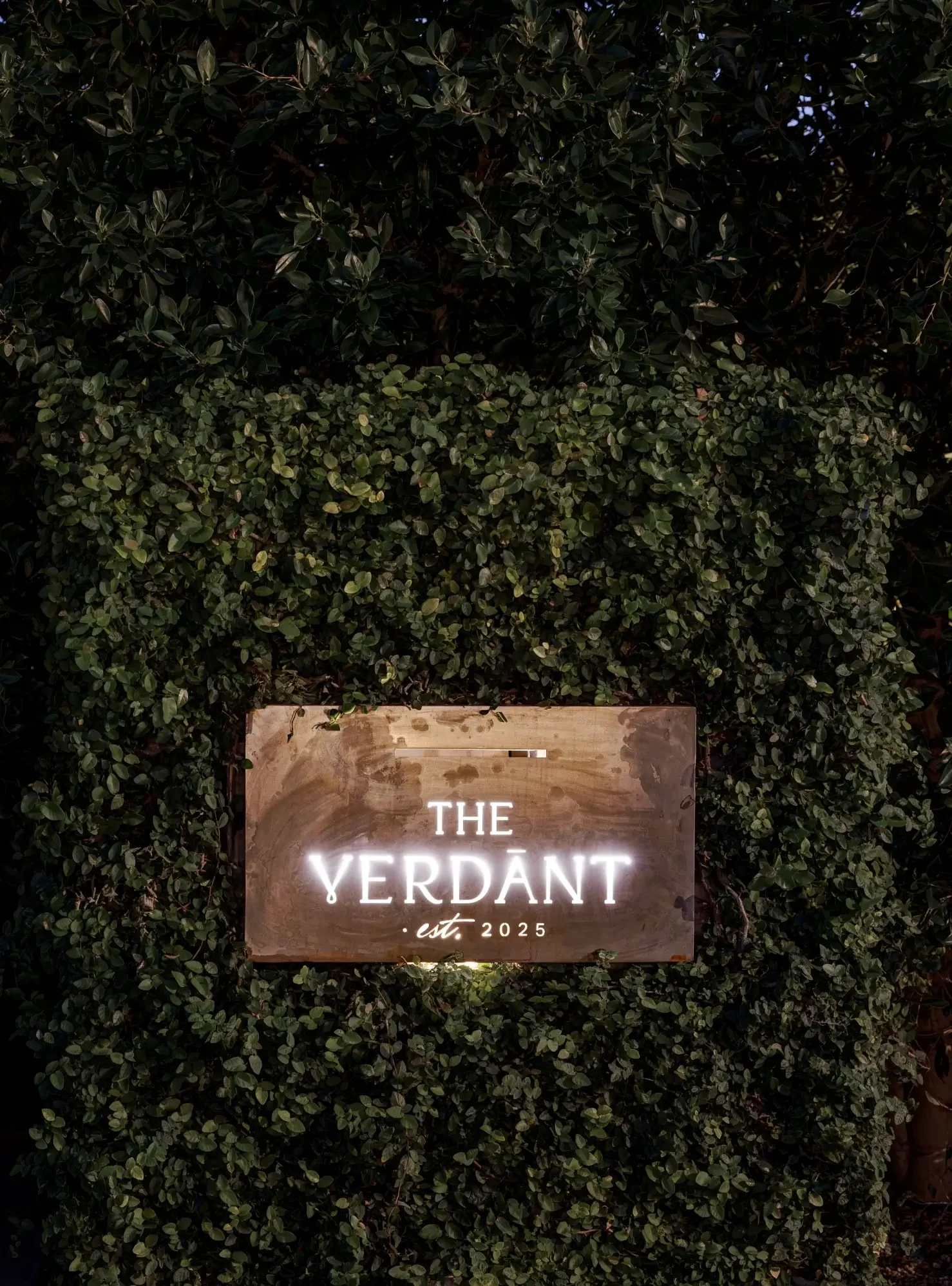 scottsdale-luxury-vacation-rentals-the-verdant-sign-night.webp