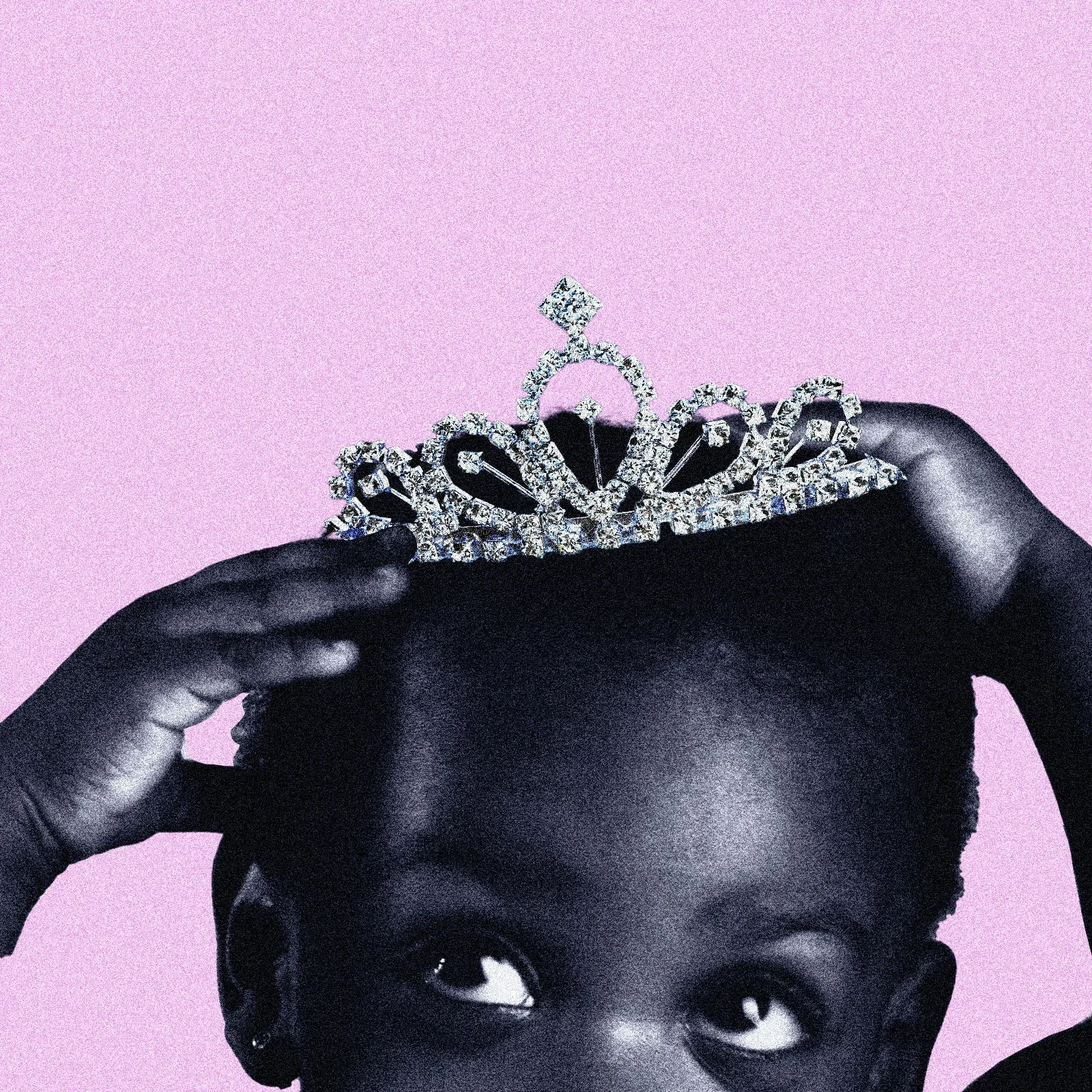 A young person with dark skin holding a glittering tiara above their head, set against a pink background.
