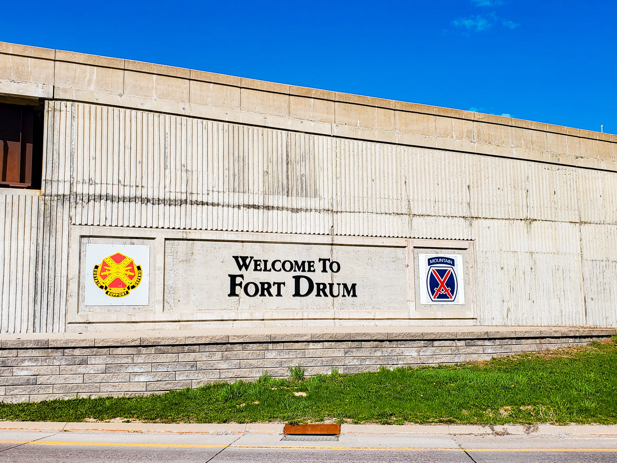 Fort Drum NY welcome sign on bridge.jpg