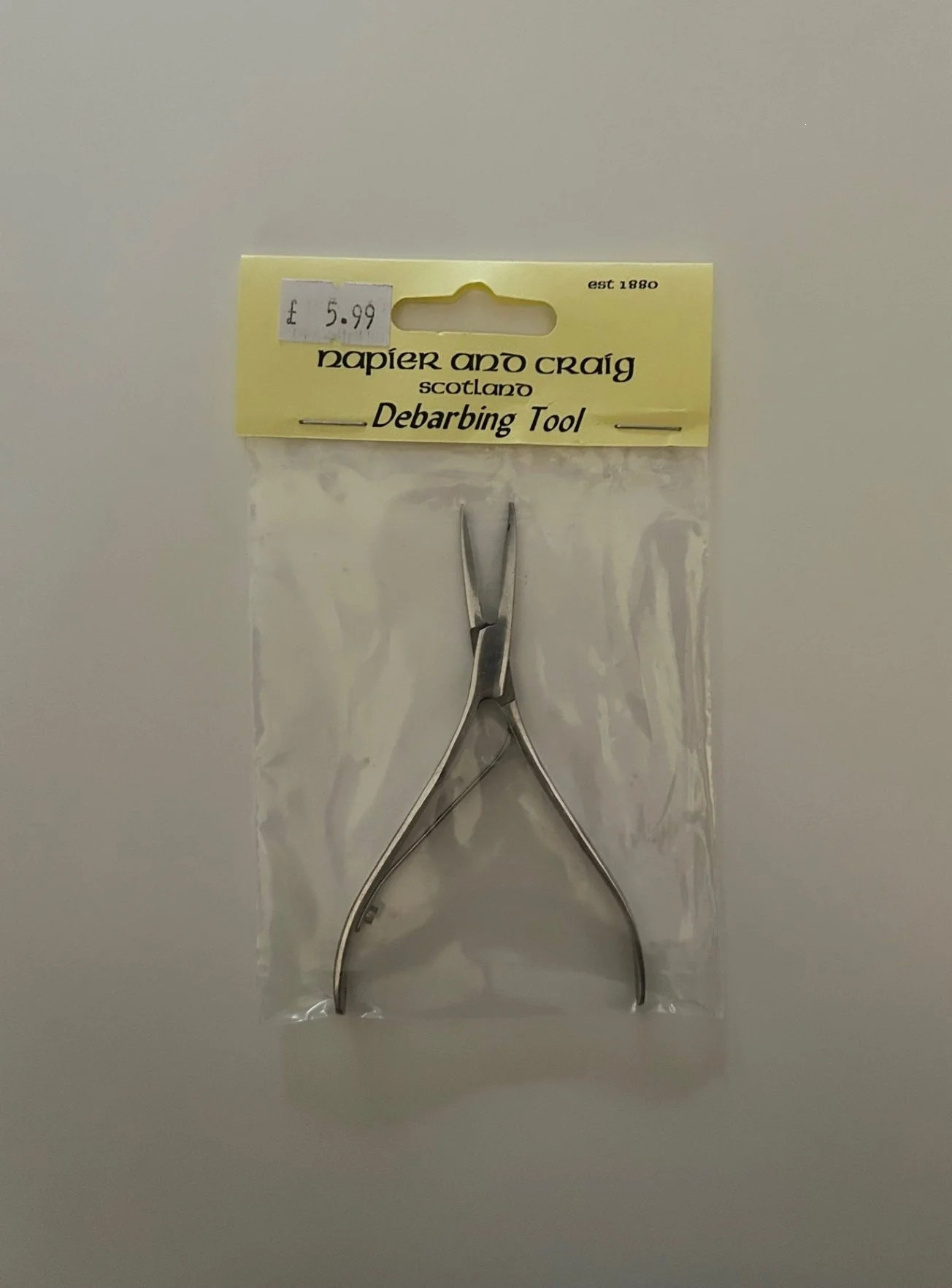 Napier and Craig Debarbing Tool
