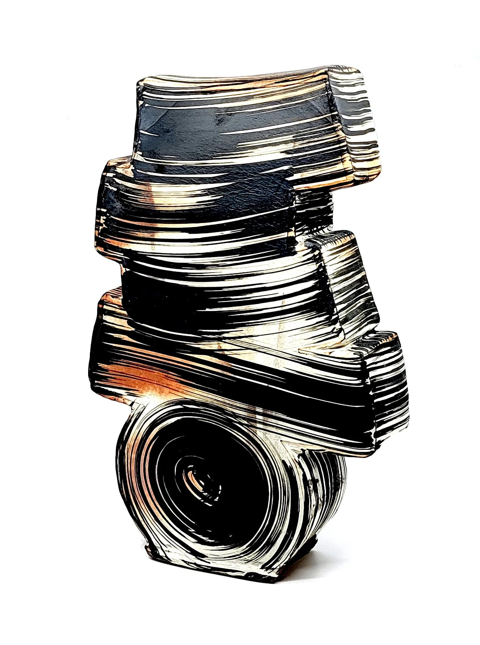 Abstract clay sculpture with black, white, and amber swirls on a white background.