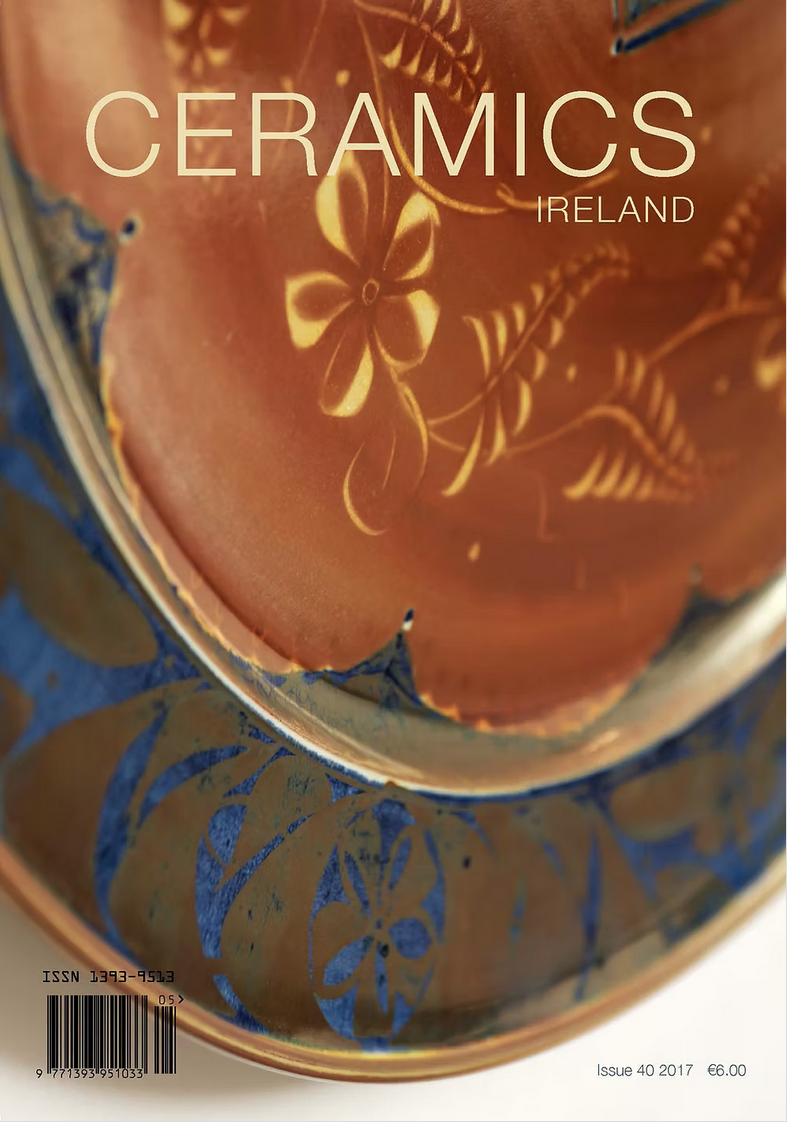 Close-up of a decorative ceramic plate or cover featuring floral motifs, with the text "CERAMICS IRELAND" and issue details.