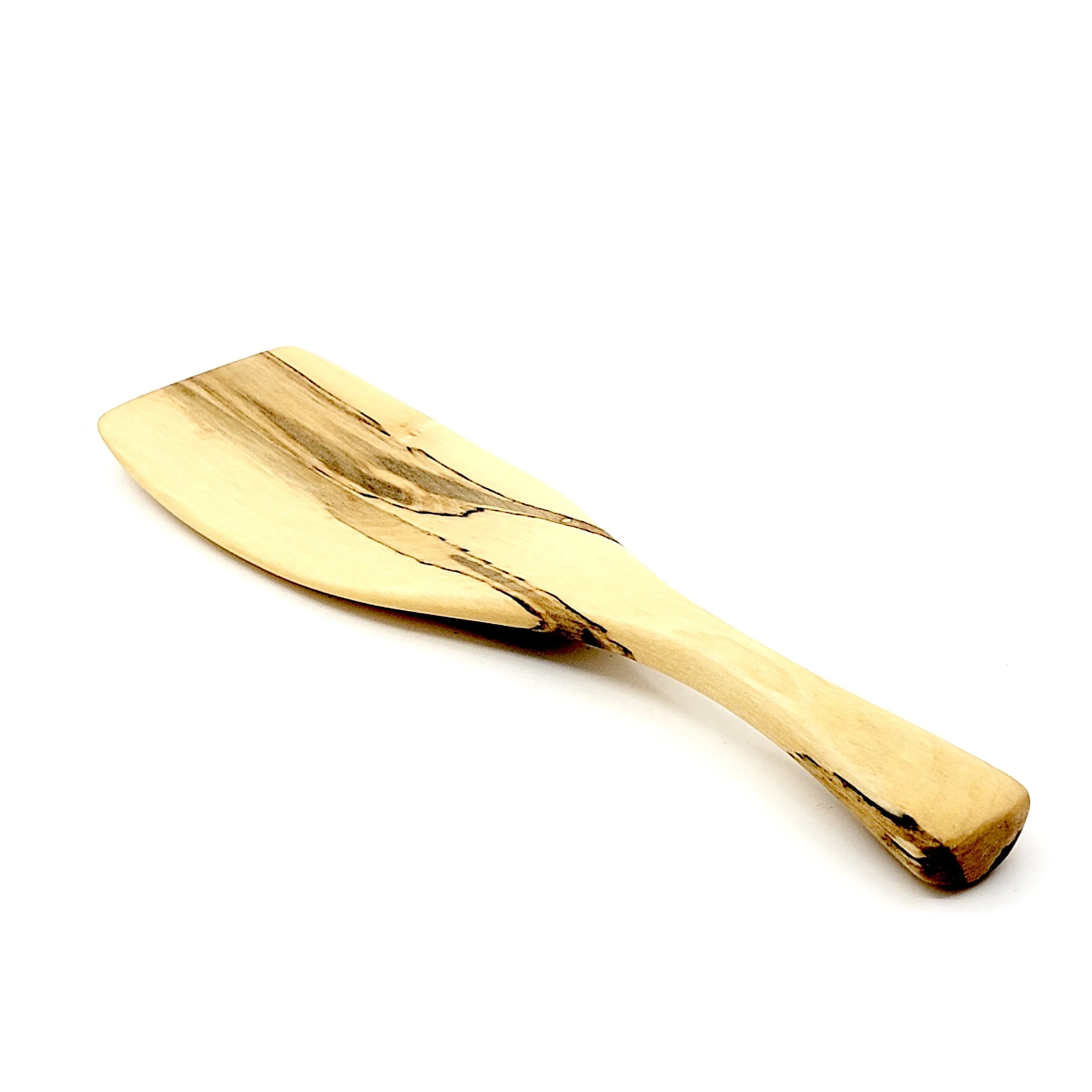 Wooden trowel with a natural finish and dark streaks on a white background.