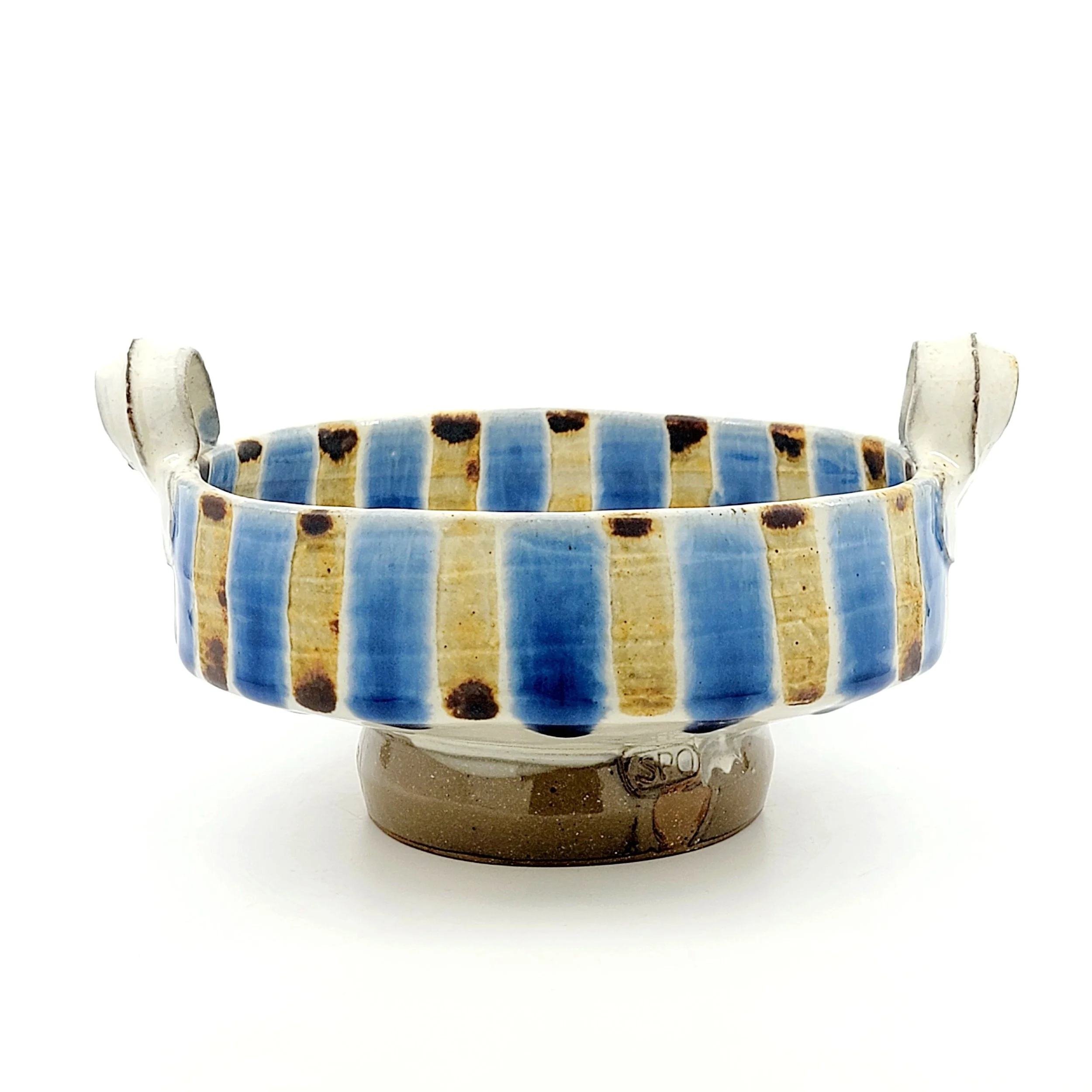 Ceramic bowl with vertical blue, yellow, and brown striped pattern, on a white background.