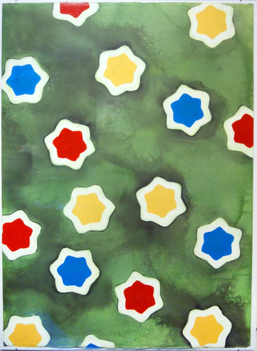 A painting with colorful star-shaped game pieces in red, blue, and yellow on a green background.