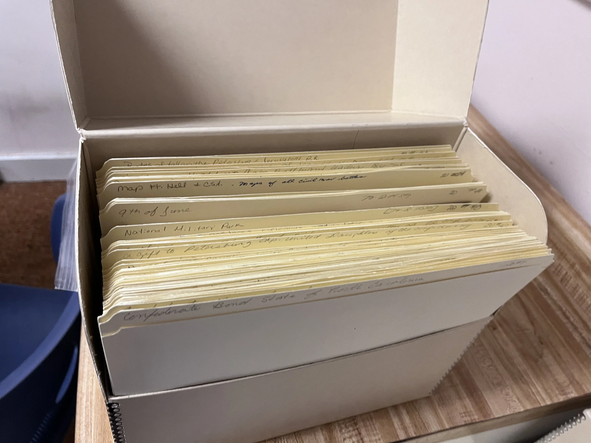 A gaylord conservation box filled with folders containing  booklets, ephemera and pamphlets,