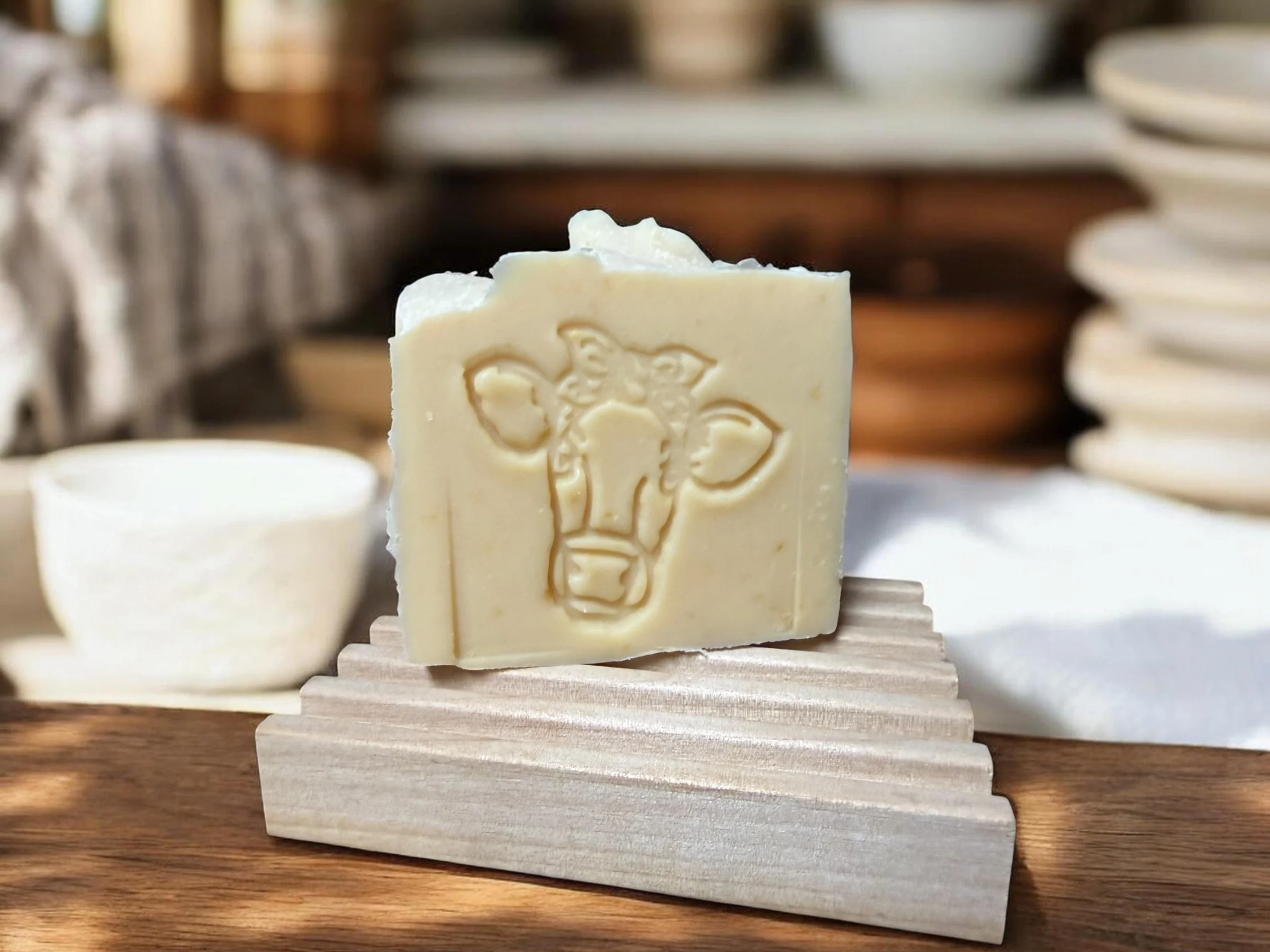 Unscented handmade soap bar — raw Jersey milk, tallow, and honey, fragrance-free - spa setting