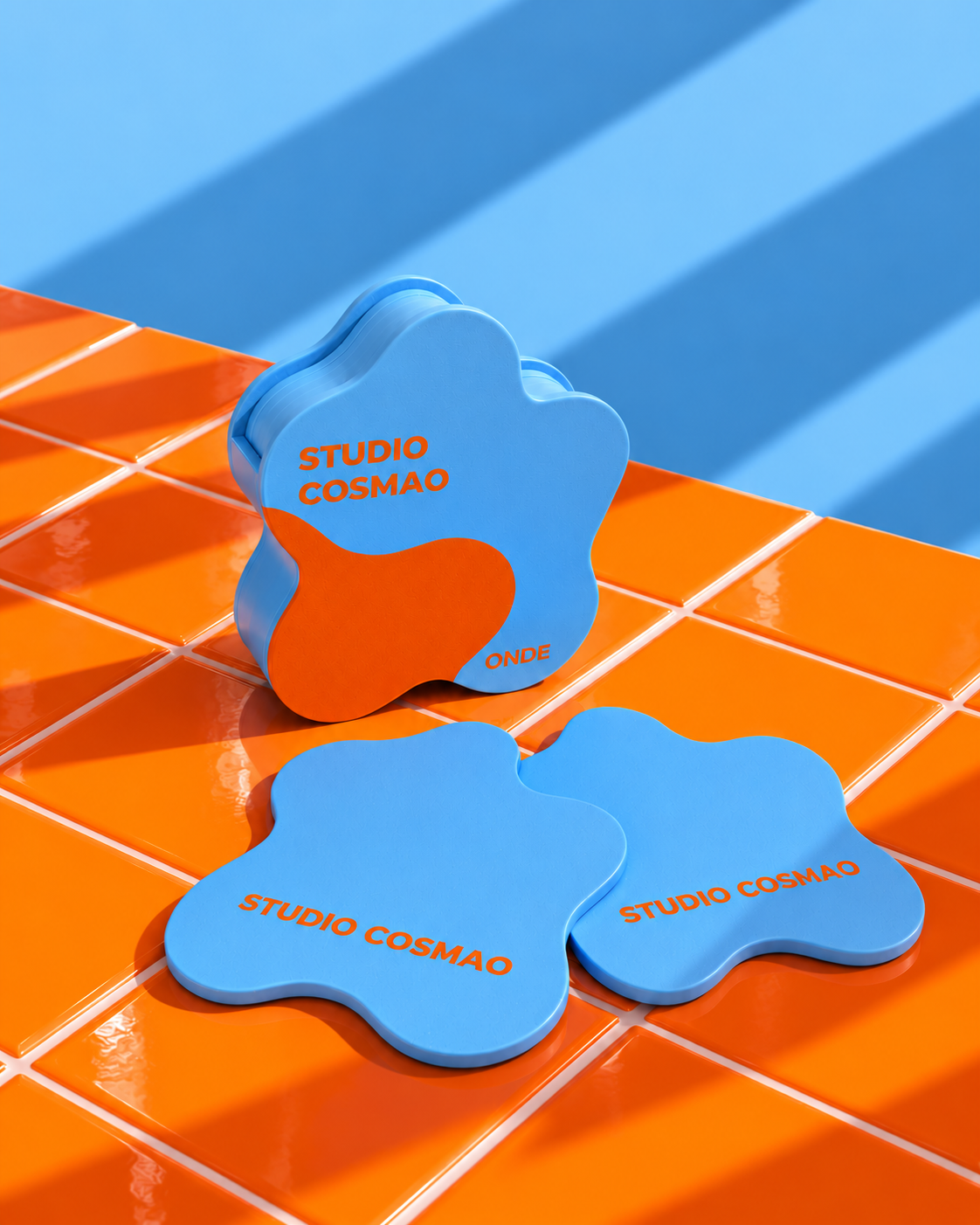 Coasters Cosmao bleus sur fond orange.png