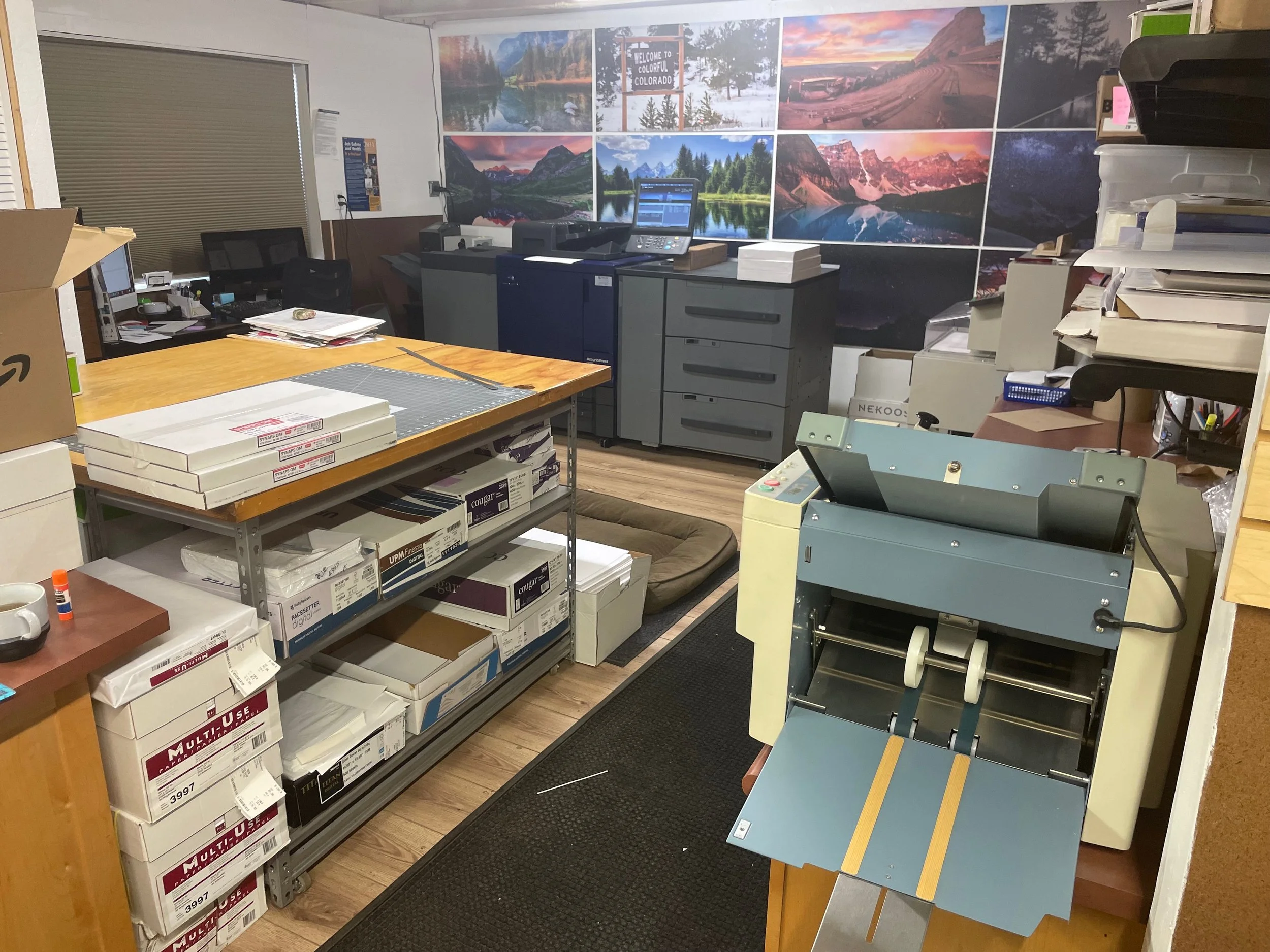 Commercial paper printing and finishing area at On Demand Print Center in Greeley, Colorado