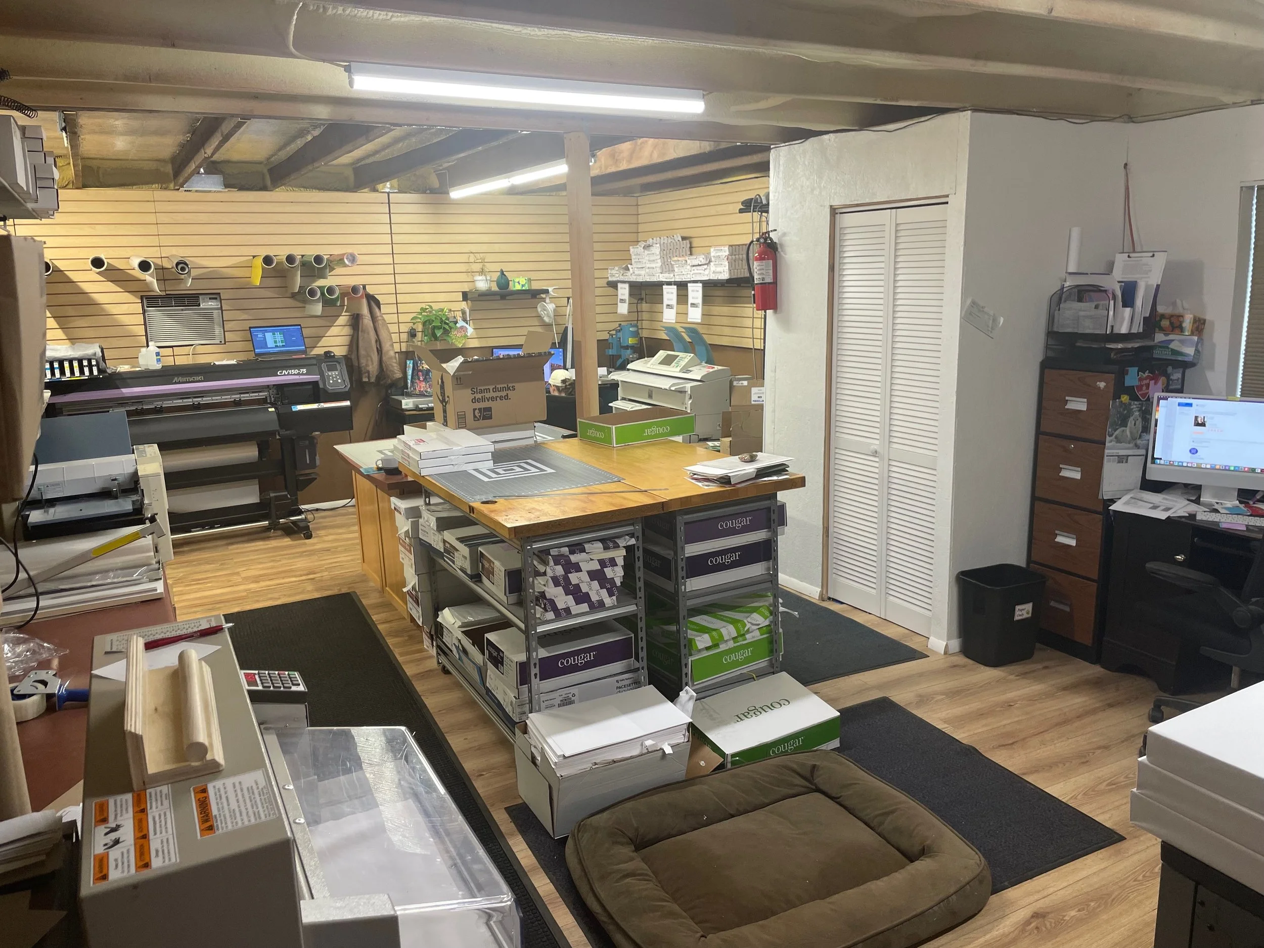 Wide format vinyl printing equipment at On Demand Print Center in Greeley, Colorado