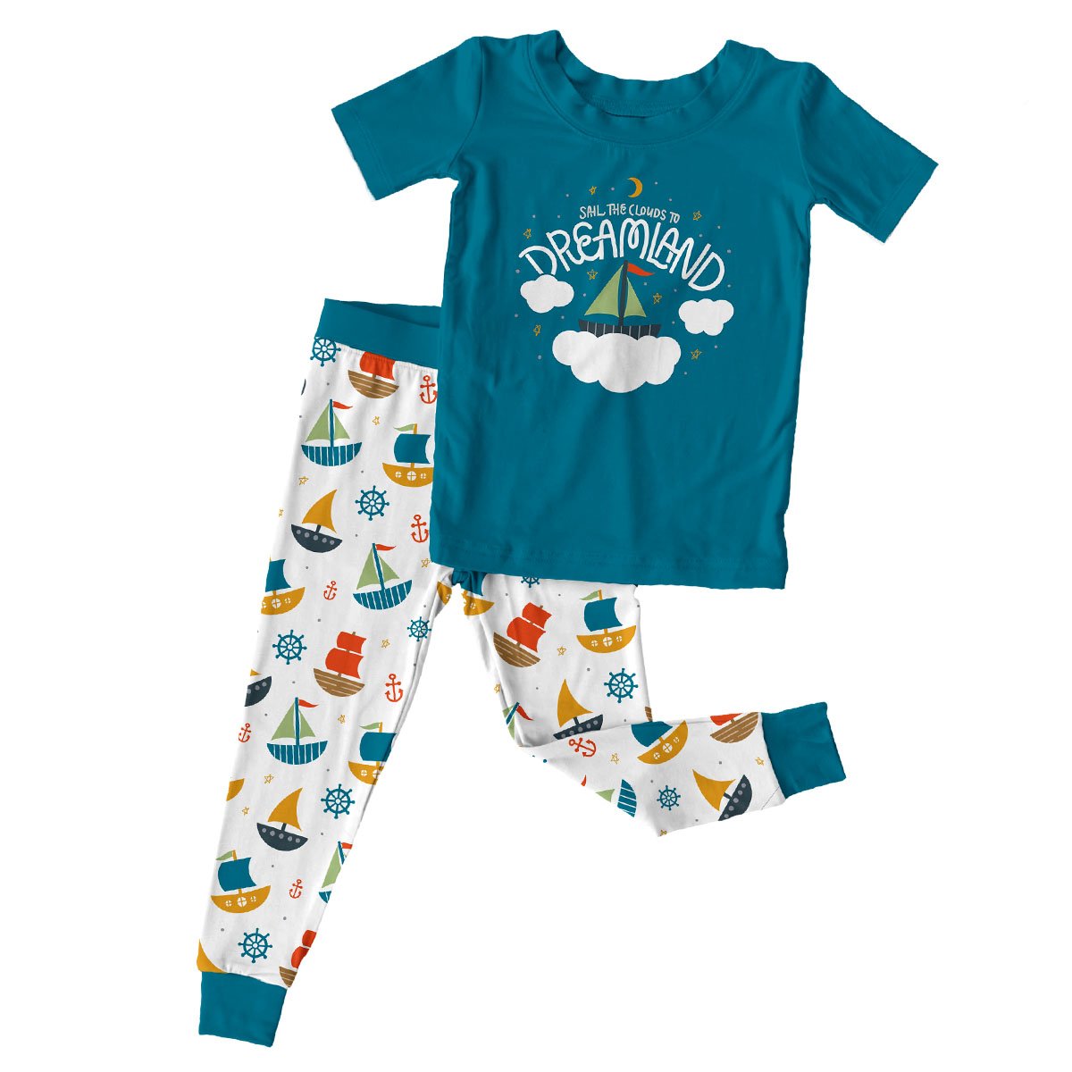 A children's pajama set with a blue T-shirt featuring a sailboat and clouds graphic with the text 'Sail the clouds to Dreamland'. The matching pants have a nautical pattern with sailboats, anchors, and ship wheels in colors like blue, red, yellow, an