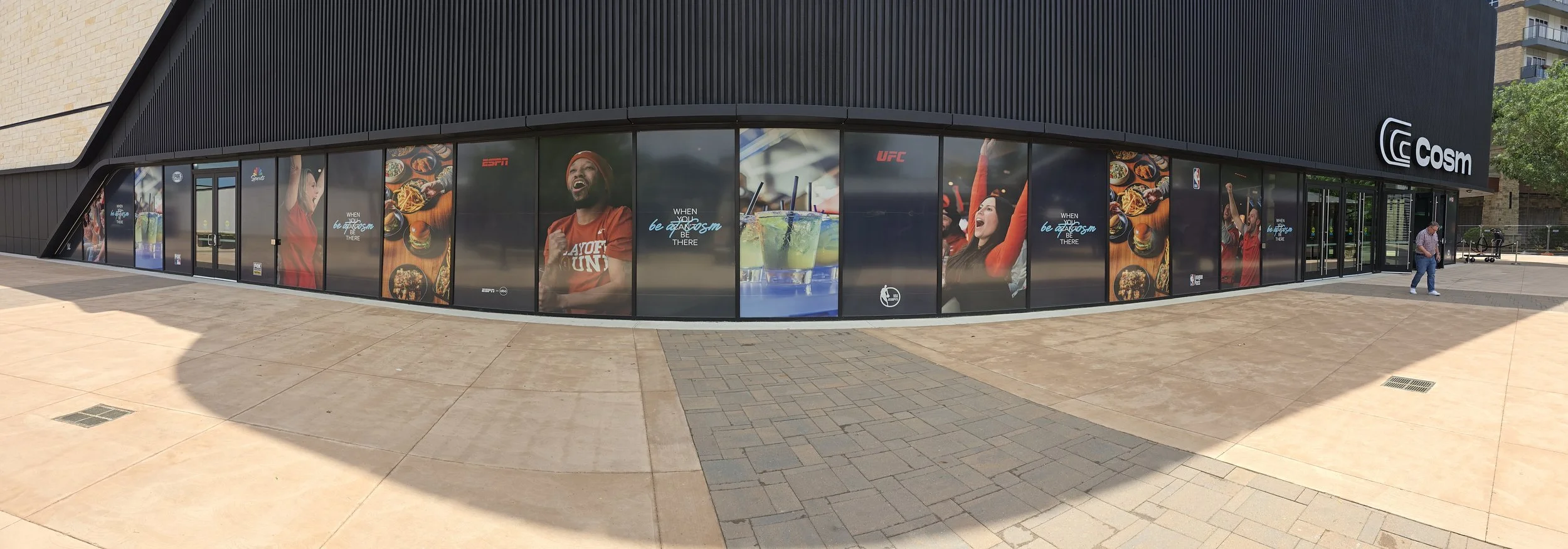 Perforated Window Install for branding at COSM Dallas