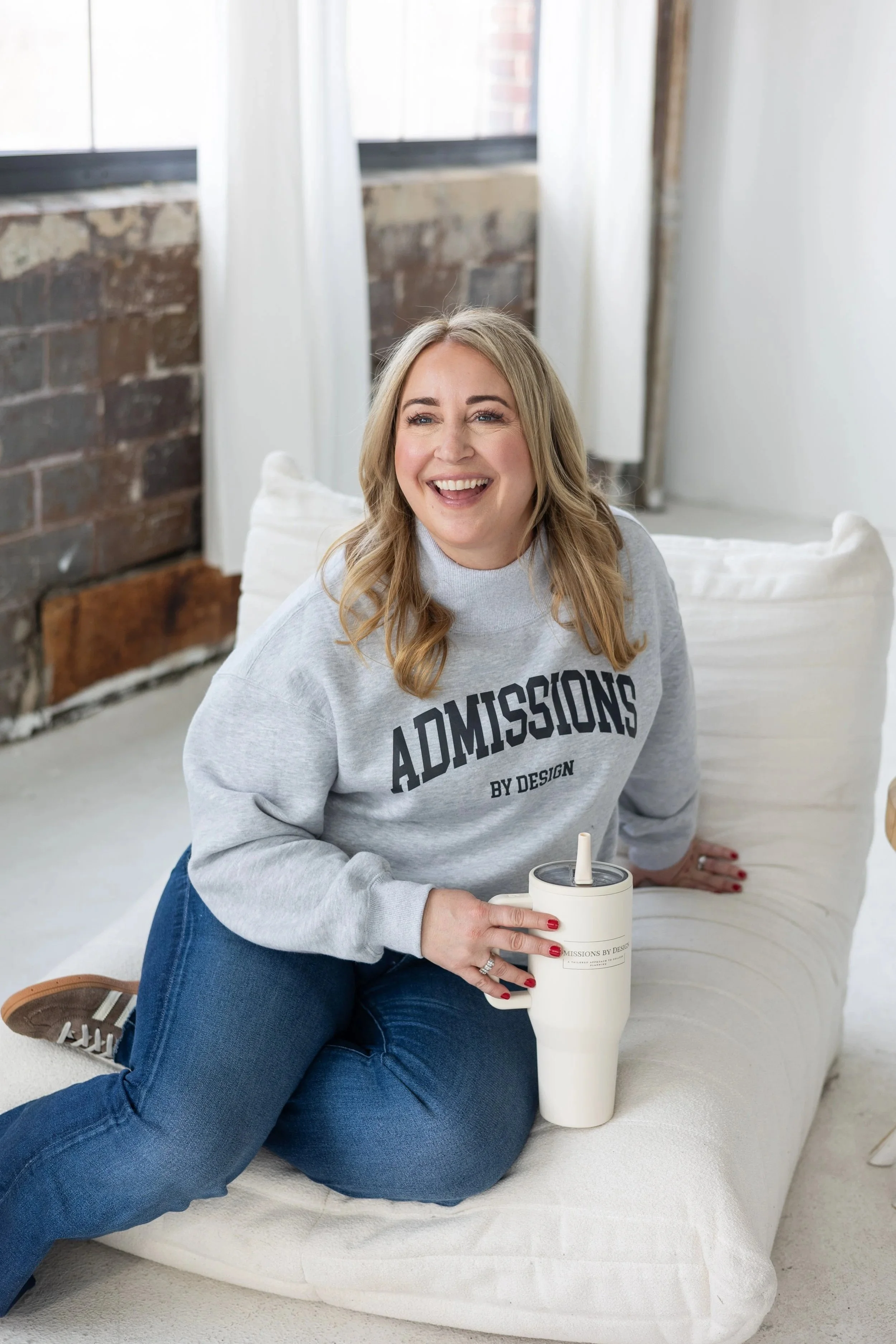 College admissions consultant working on application strategy and college planning on a laptop.