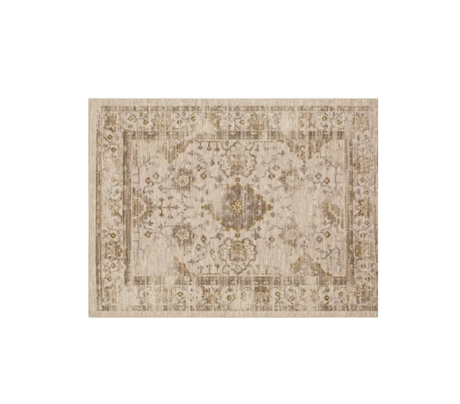 Beige and brown vintage-style area rug with intricate floral and geometric patterns.