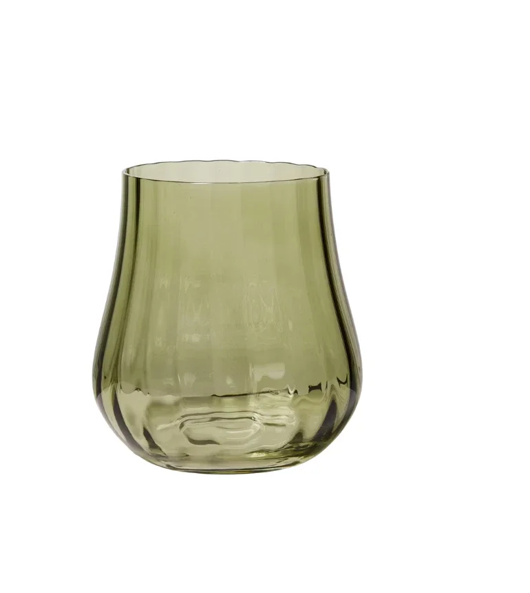 Greenish transparent glass vase with a rounded shape and an opening at the top, set against a white background.