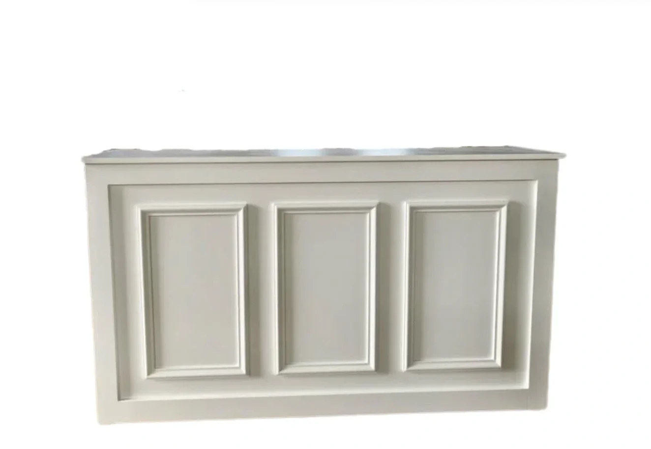 A white kitchen or bathroom cabinet with three paneled doors.