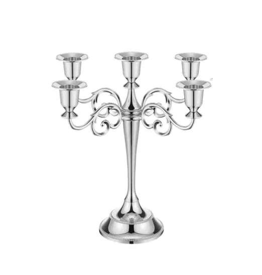 Silver five-arm candelabrum with decorative curling arms and candle holders