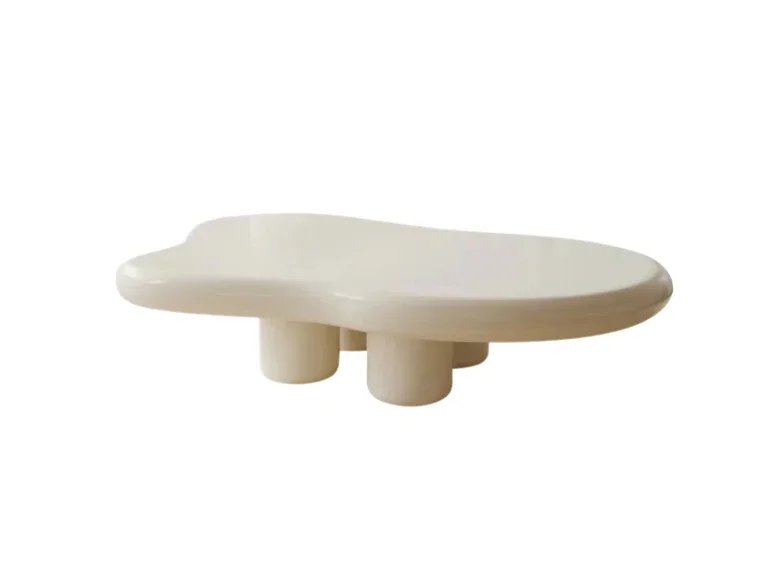 White ceramic duck-shaped dish or tray with three small cylindrical legs.