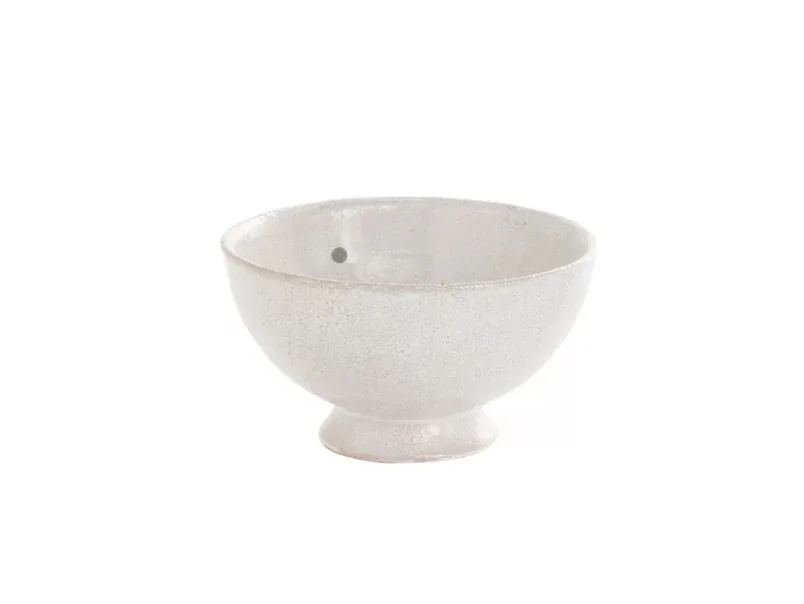 White ceramic bowl with a small gray dot inside, isolated on a white background.