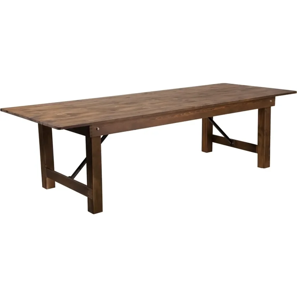 A large wooden rectangular table with sturdy legs and cross supports, isolated on a white background.