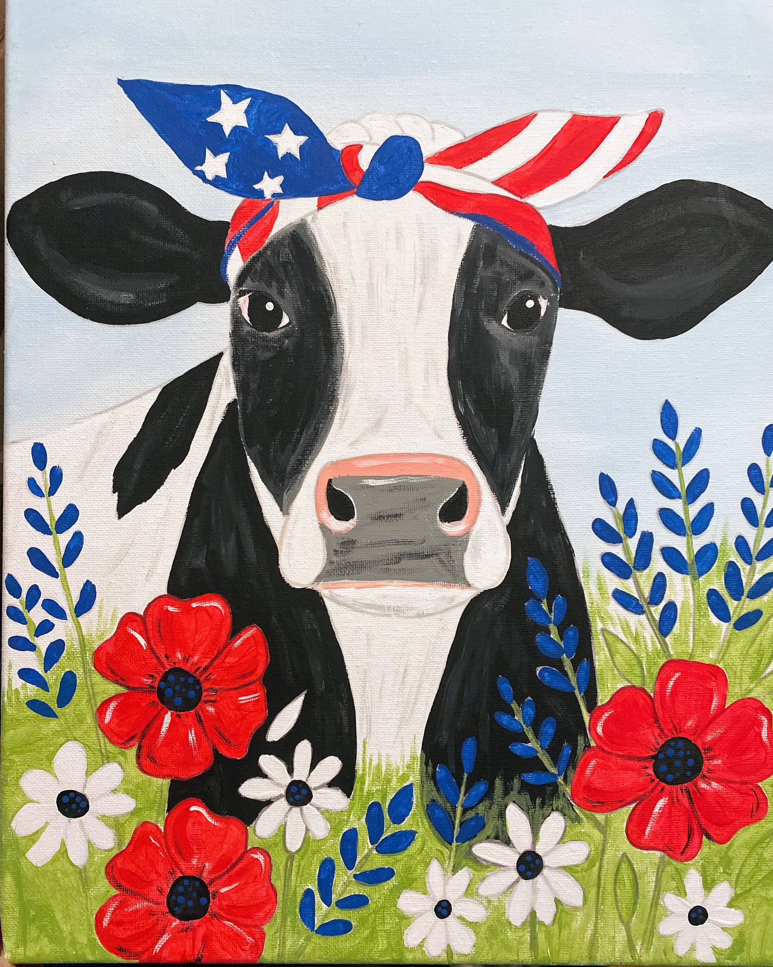 cow wearing red white and blue