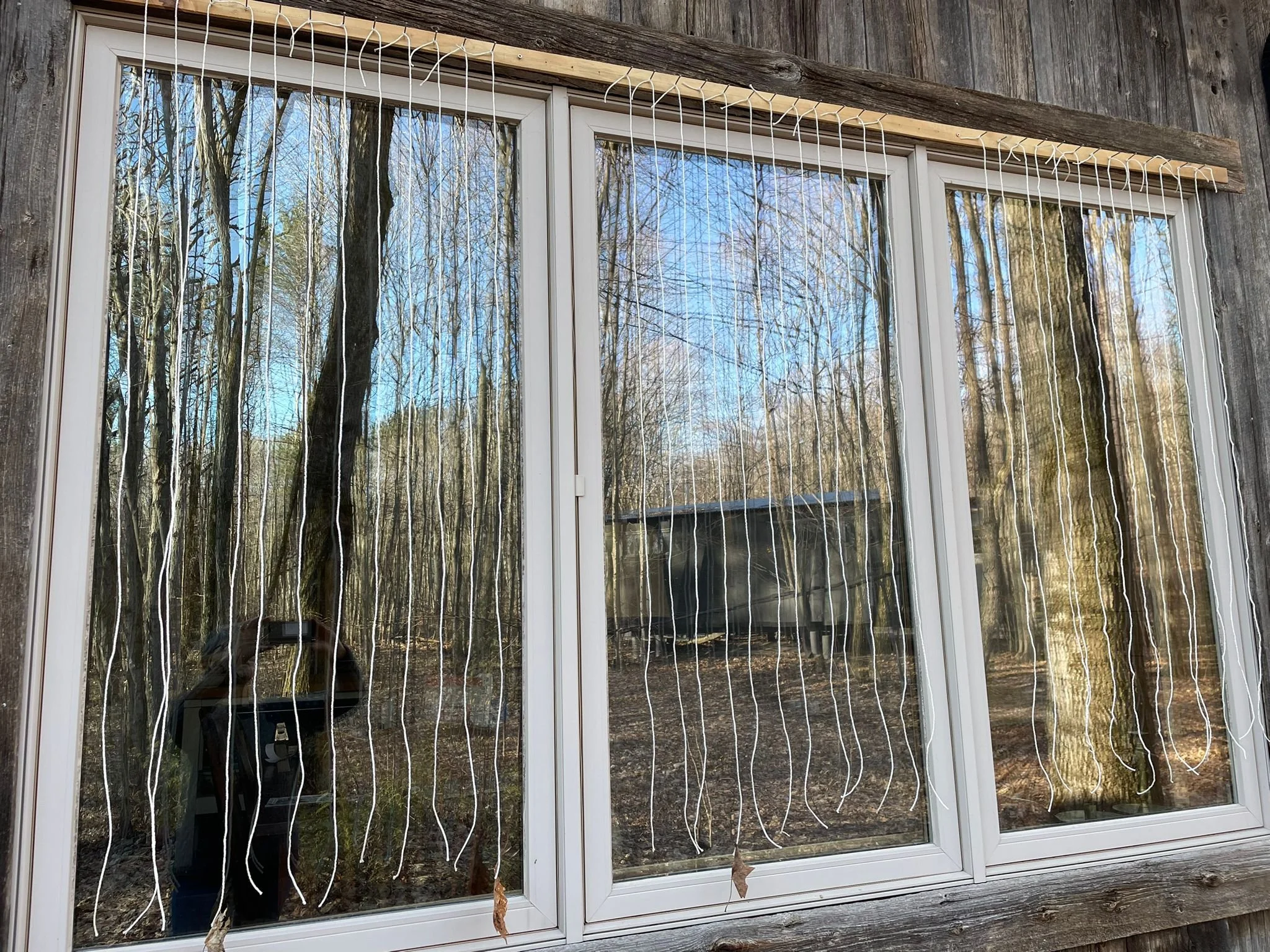 Curtains of cords may be attached outside the window