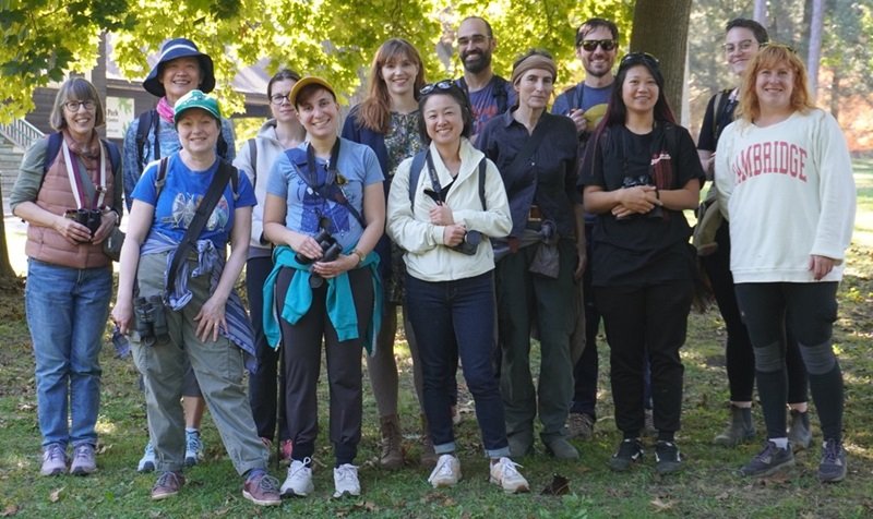 Group of FLAP Canada volunteers standing outside in a smiling group photo