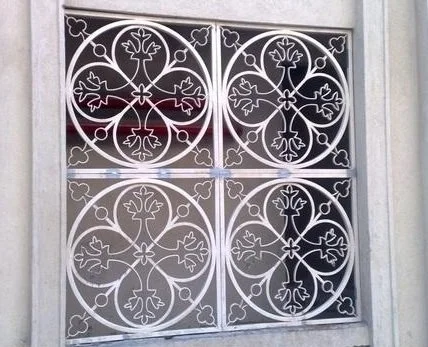 Window grilles applied to exterior home window for method to stop birds from hitting windows
