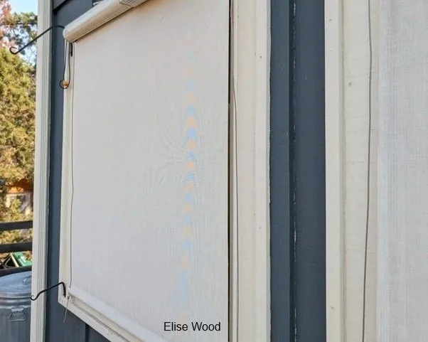 Exterior shades applied to residential or home window as way to stop birds from hitting windows