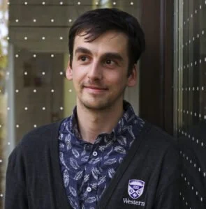 Smiling headshot of Doctor Brendon Samuels, FLAP Canada