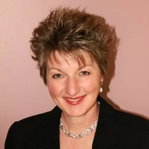 Smiling headshot of Lea M. Ray, FLAP Canada